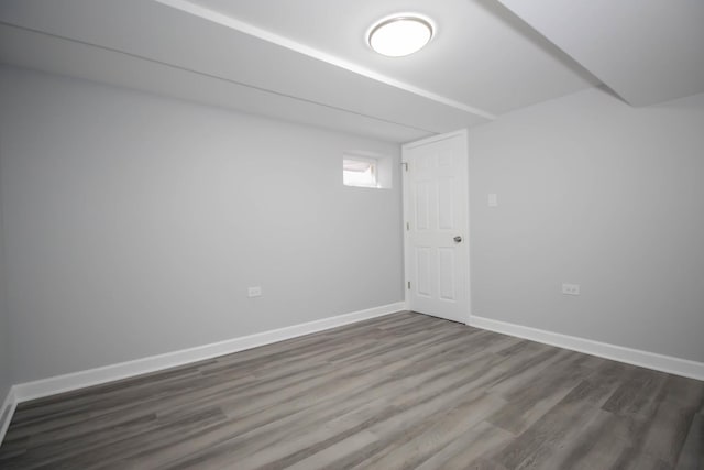 empty room with wood-type flooring