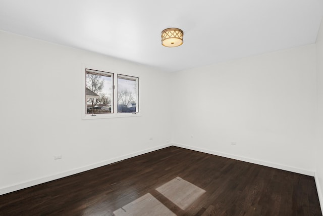 empty room featuring wood-type flooring