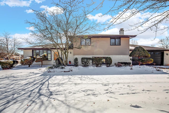 tri-level home with a garage