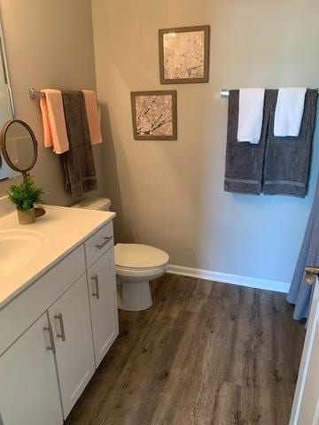 486 Ridge Ln, Bolingbrook, IL 60440 - bathroom with hardwood / wood-style flooring, vanity, and toilet