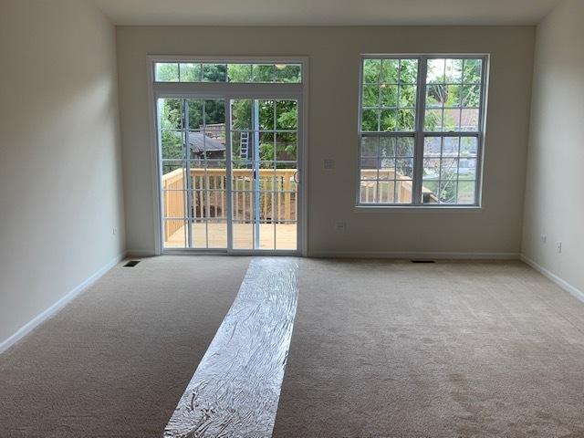 486 Ridge Ln, Bolingbrook, IL 60440 - empty room featuring carpet floors