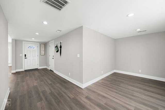 foyer featuring dark wood-type flooring