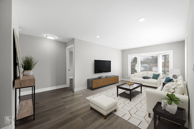 living room with dark hardwood / wood-style floors