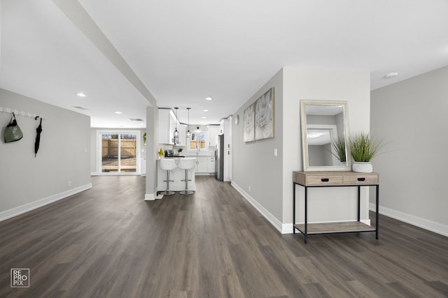 interior space with dark hardwood / wood-style flooring