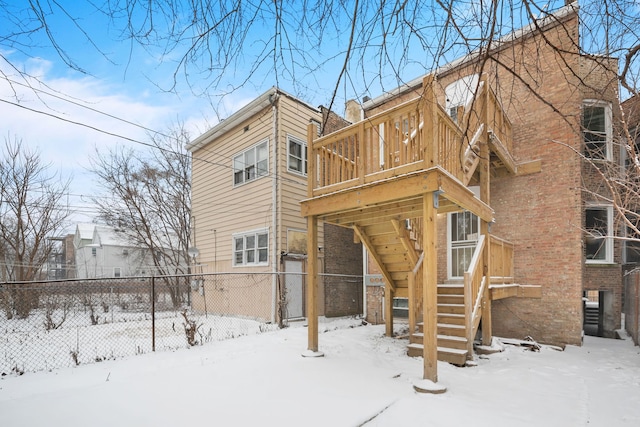 view of snow covered house