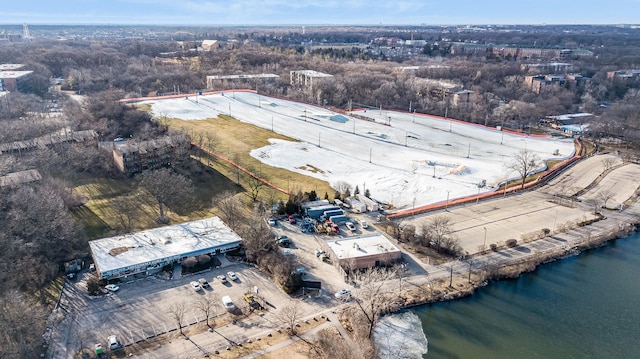 birds eye view of property featuring a water view