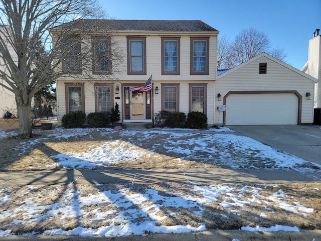 view of front of house featuring concrete driveway and an attached garage