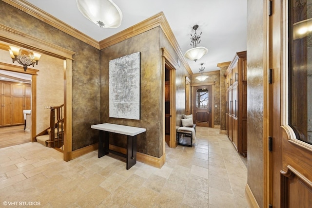 5101 Central Ave, Western Springs, IL 60558 - corridor with stone tile flooring, crown molding, stairs, baseboards, and a chandelier