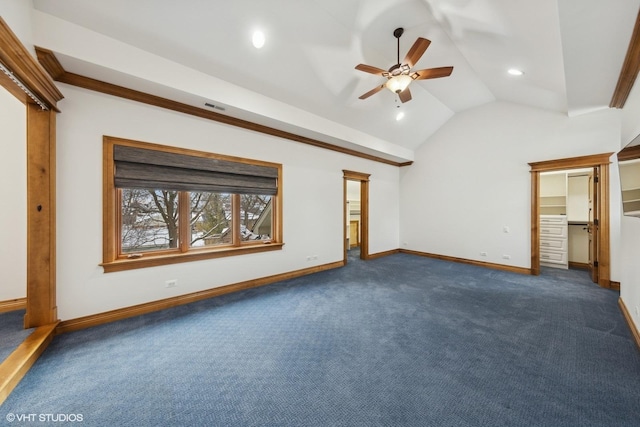 unfurnished bedroom featuring ceiling fan, lofted ceiling, and dark carpet