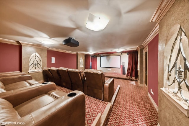 carpeted cinema room featuring ornamental molding