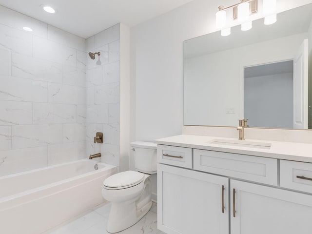 bathroom featuring marble finish floor, shower / bath combination, vanity, and toilet