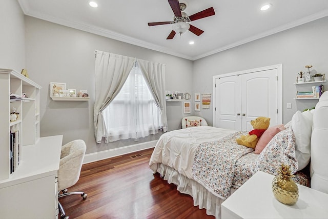 bedroom featuring a closet, ornamental molding, wood finished floors, and recessed lighting