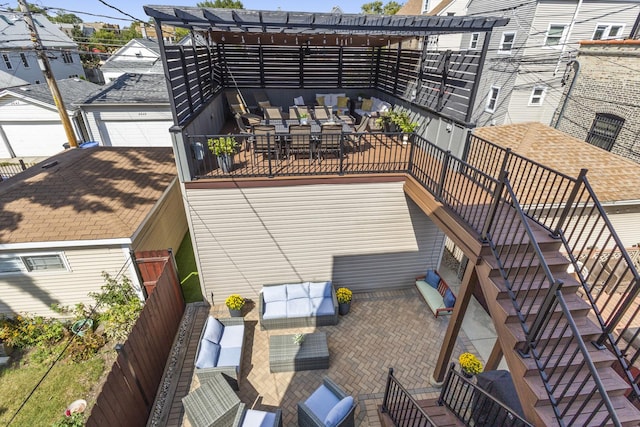 exterior space featuring outdoor dining space, stairs, an outdoor hangout area, and a patio