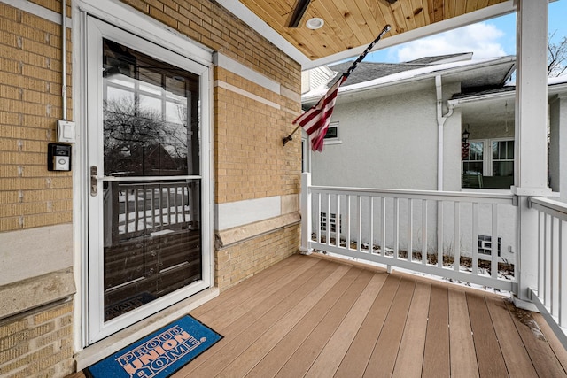 entrance to property with brick siding