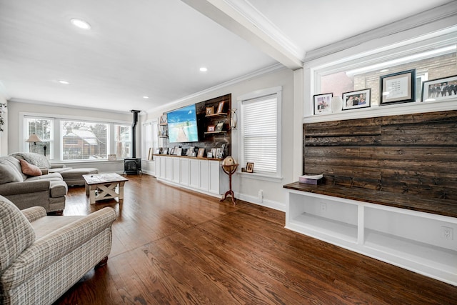 living room featuring recessed lighting, wood finished floors, a wood stove, and crown molding