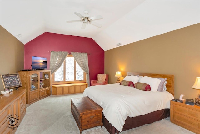 carpeted bedroom with lofted ceiling and ceiling fan