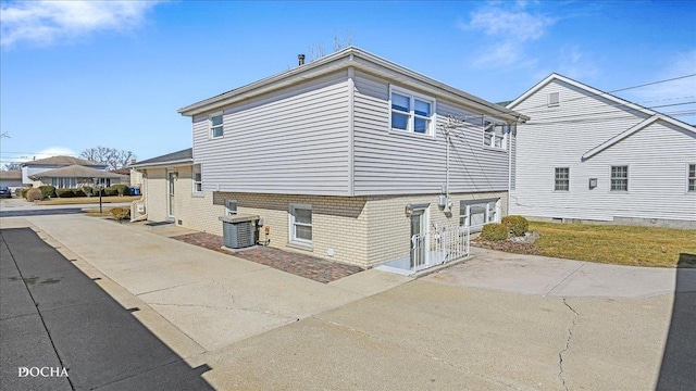 view of property exterior featuring central AC unit