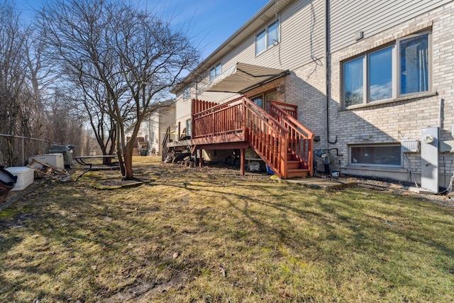 view of yard with stairs and a wooden deck