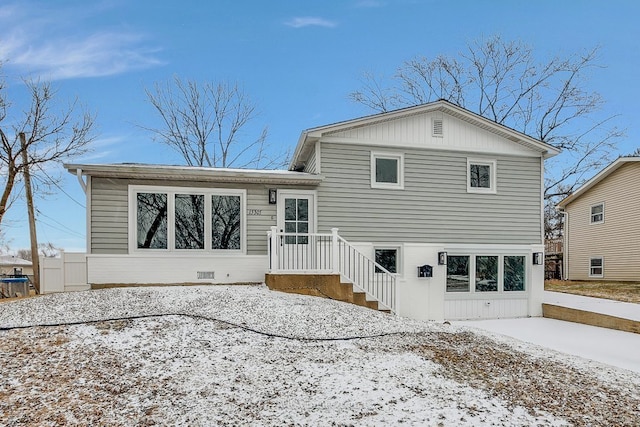 view of snow covered property