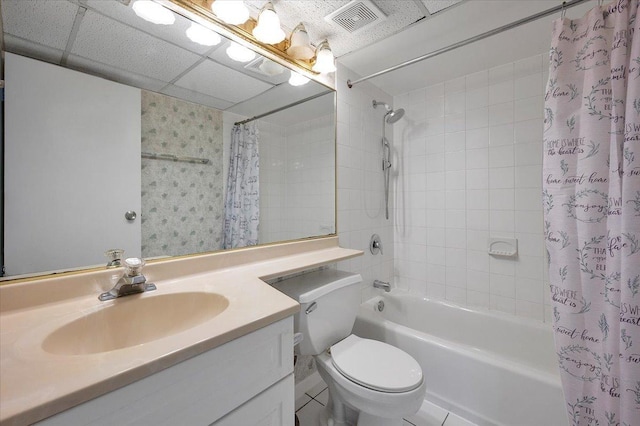 full bathroom with vanity, toilet, and shower / bath combo with shower curtain