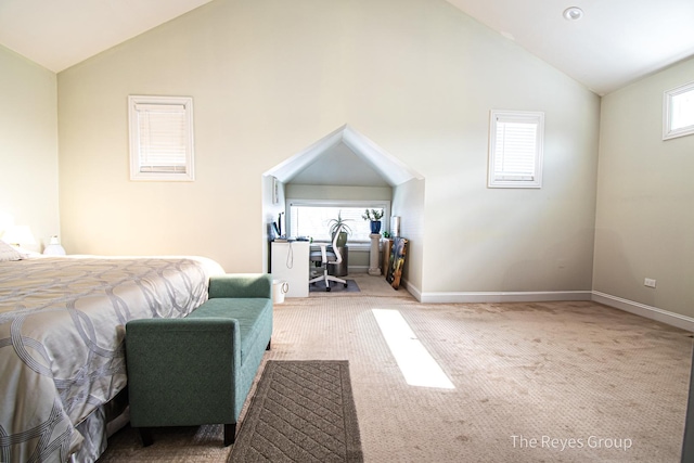 bedroom with multiple windows, carpet floors, high vaulted ceiling, and baseboards