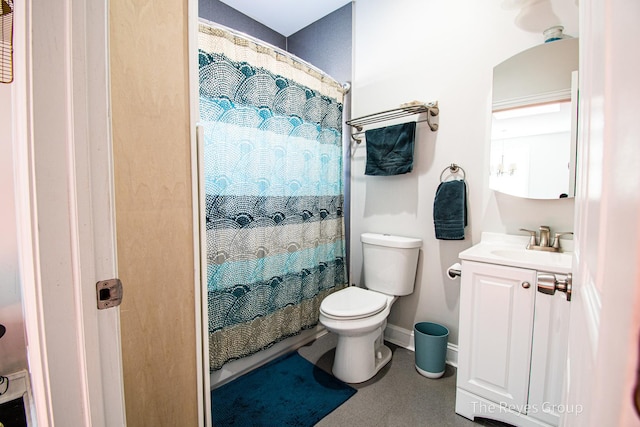 bathroom featuring baseboards, toilet, vanity, and a shower with curtain