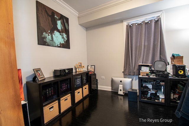 office featuring wood finished floors, baseboards, and ornamental molding