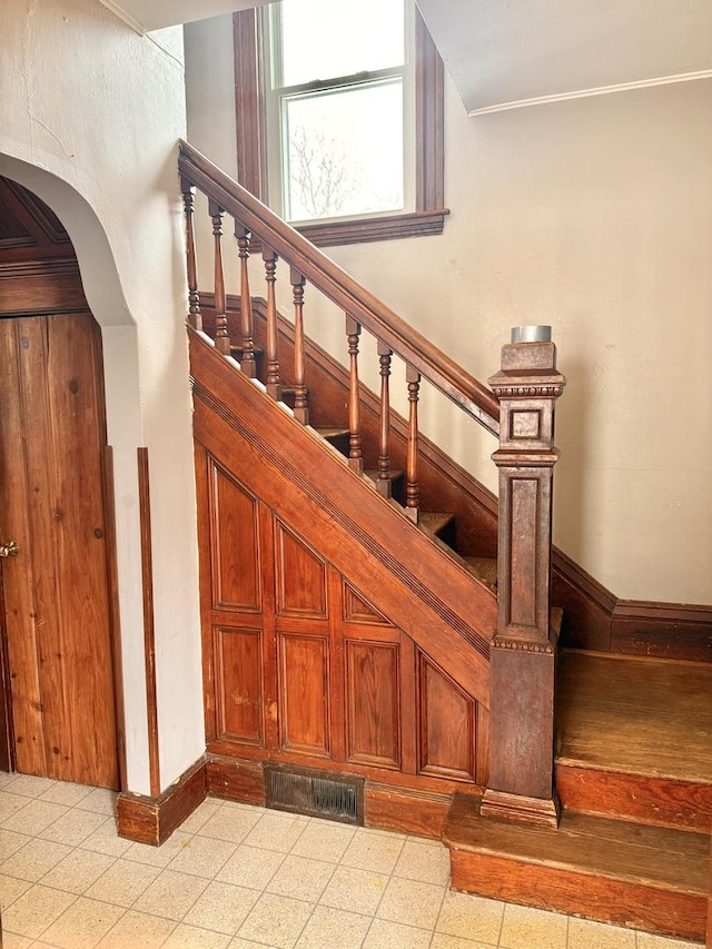 stairs with crown molding