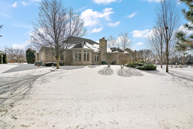 view of snow covered property