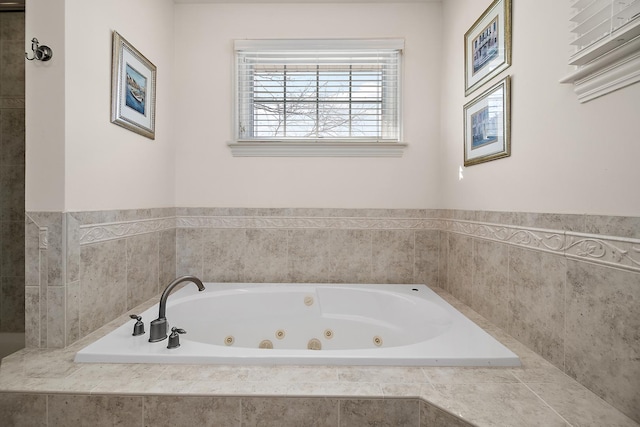 bathroom with tiled bath