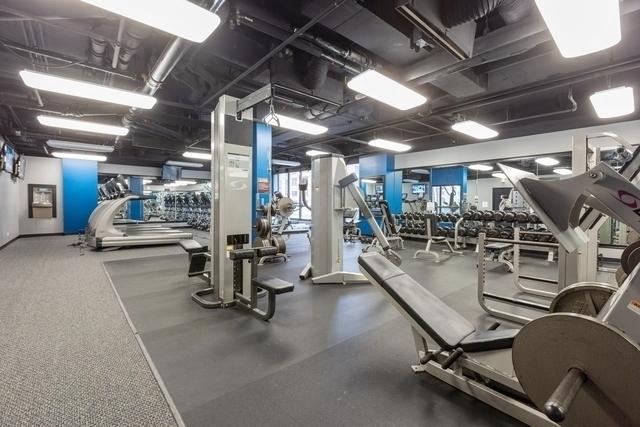 workout area featuring a wealth of natural light