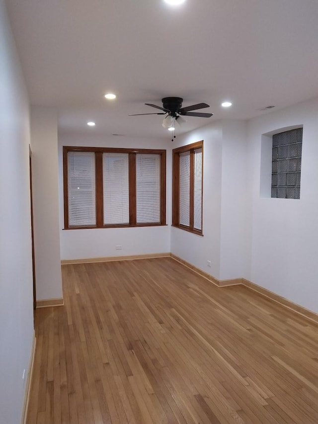 2921 N Kedzie Ave, Chicago, IL 60618 - spare room with baseboards, recessed lighting, a ceiling fan, and light wood-style floors