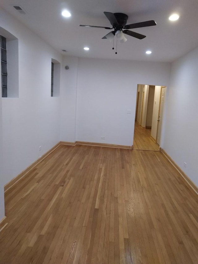 2921 N Kedzie Ave, Chicago, IL 60618 - spare room with light wood finished floors, recessed lighting, visible vents, a ceiling fan, and baseboards