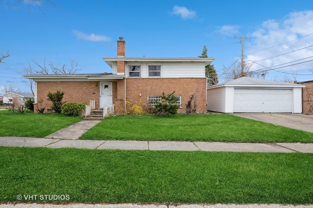 split level home with a detached garage, an outdoor structure, a front yard, brick siding, and a chimney