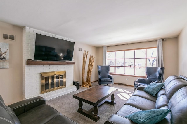 living room with a brick fireplace, visible vents, light carpet, and baseboards