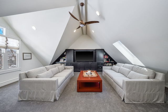 carpeted living area with lofted ceiling with skylight, recessed lighting, a ceiling fan, and baseboards