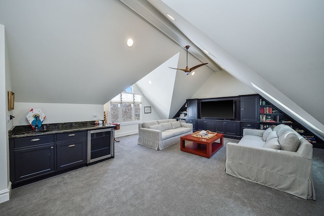 living room with a ceiling fan, carpet, beverage cooler, and vaulted ceiling with beams