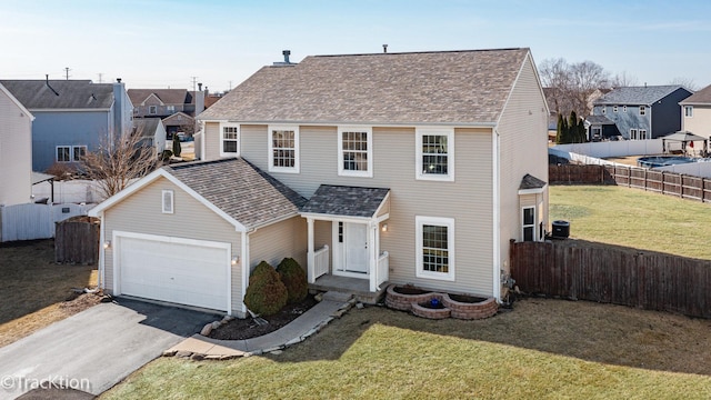 traditional-style house with fence, aphalt driveway, a residential view, roof with shingles, and a front yard