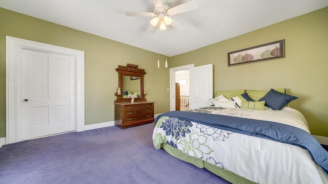 carpeted bedroom featuring ceiling fan