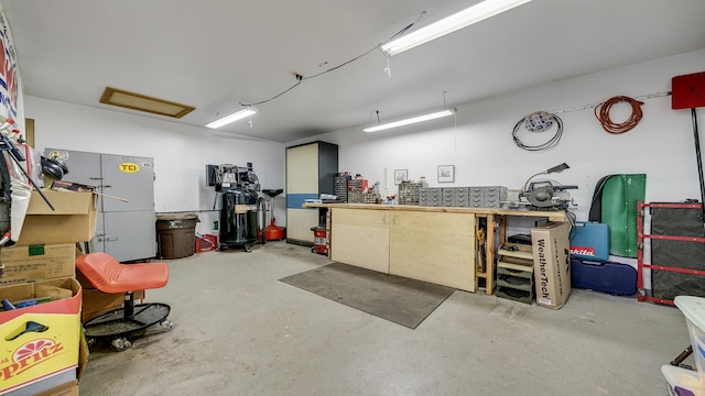 garage featuring a workshop area