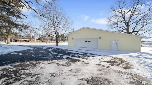 view of snow covered garage