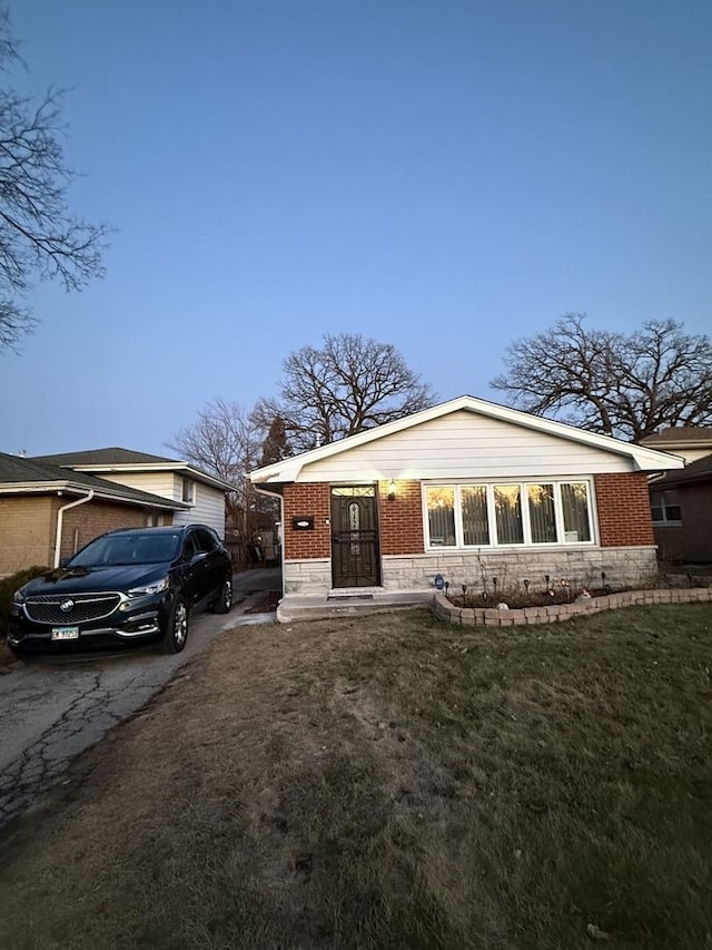 view of front of home with a front lawn