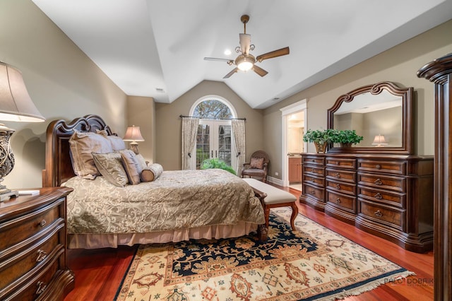 bedroom with connected bathroom, hardwood / wood-style floors, vaulted ceiling, and ceiling fan