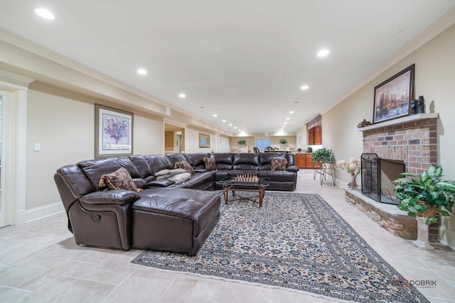 living room with ornamental molding and a fireplace