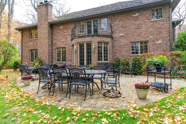 back of house with a patio area