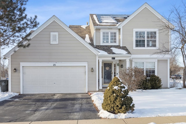 view of front of house with a garage