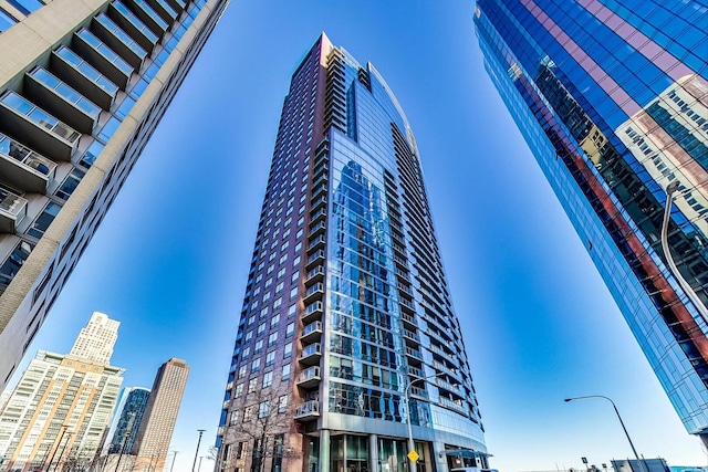 view of building exterior featuring a view of city