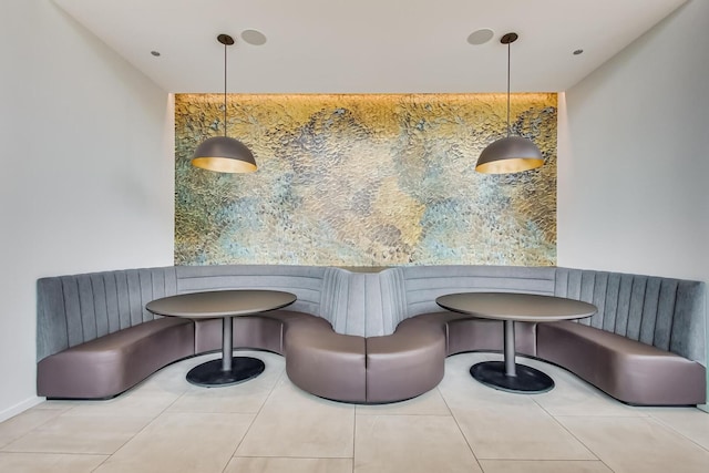 dining space with tile patterned flooring and breakfast area