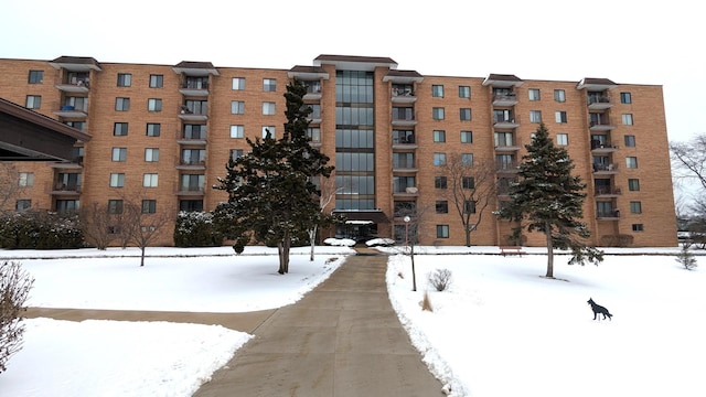 view of snow covered property