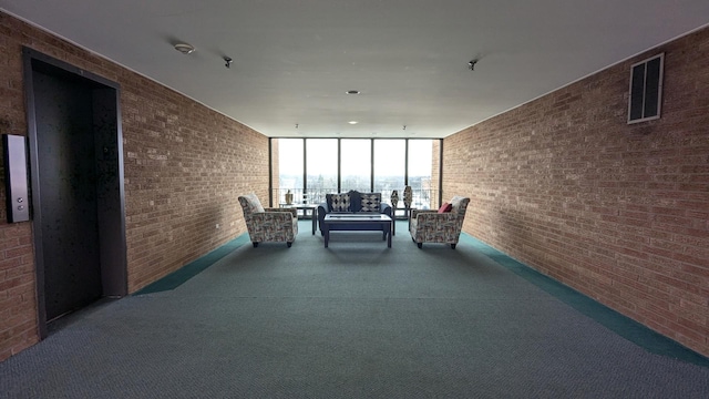 interior space with outdoor lounge area and visible vents
